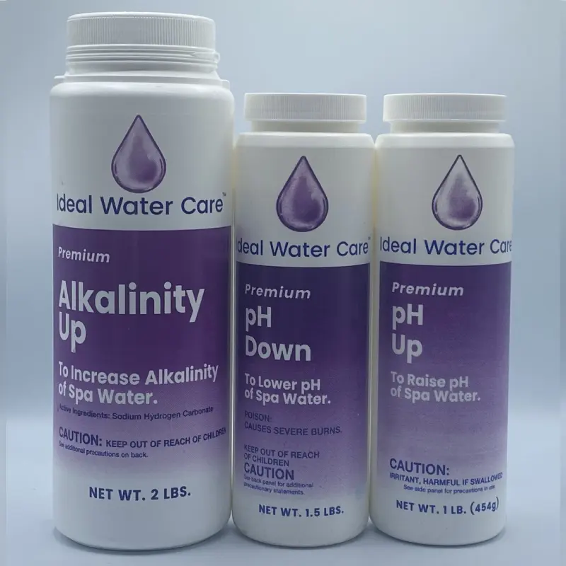 A group of three bottles of water that are purple.